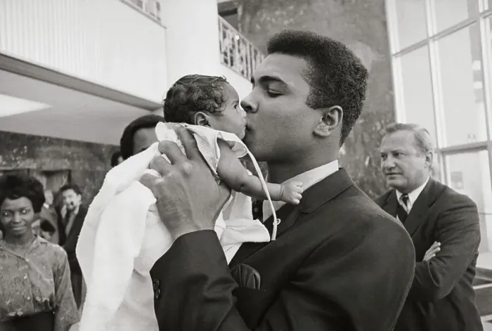 Framed Print : Cassius Clay Kissing Very Small Baby Framed Print : Cassius Clay Kissing Very Small Baby