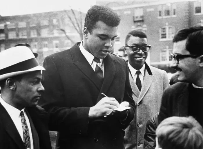 Framed Print : Cassius Clay Signs Autographs Framed Print : Cassius Clay Signs Autographs