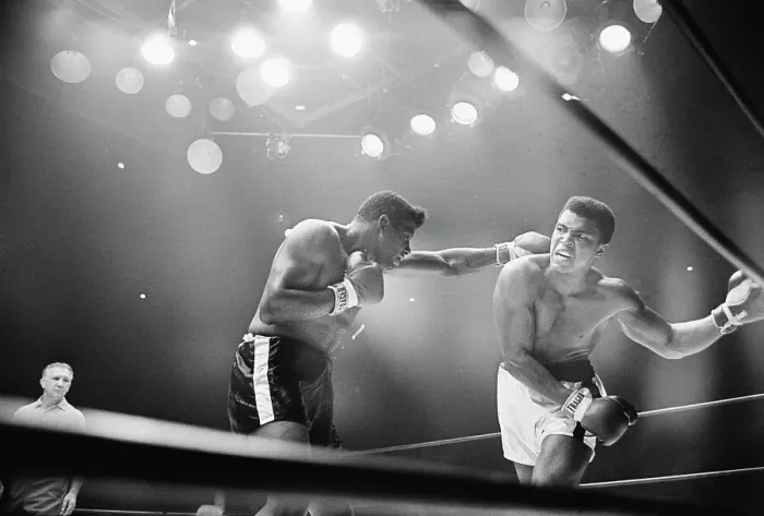 Framed Print : Cassius Clay Snarling at Floyd Patterson Framed Print : Cassius Clay Snarling at Floyd Patterson