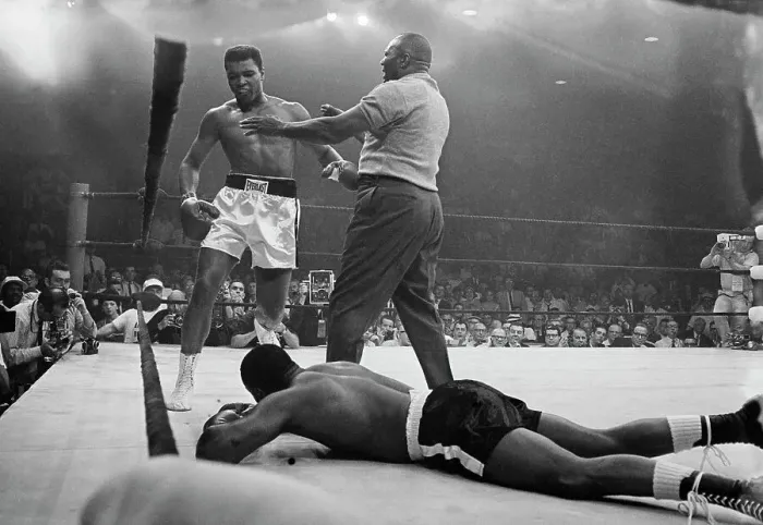 Framed Print : Cassius Clay Towering Over Sonny Liston During Boxing Match