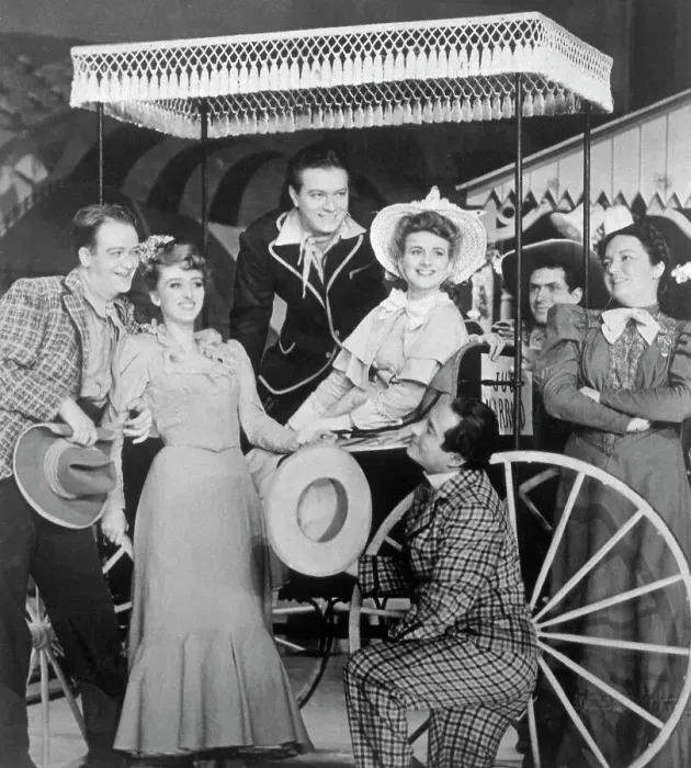 Framed Print : Cast of Oklahoma Standing by Cart Framed Print : Cast of Oklahoma Standing by Cart
