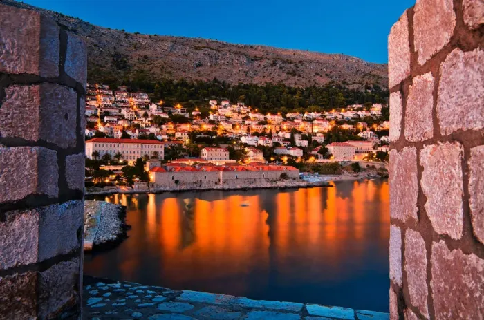 Framed Print : Castle. Opening in castle wall provides stunning across bay from Dubrovnik Old Town Framed Print : Castle. Opening in castle wall provides stunning across bay from Dubrovnik Old Town