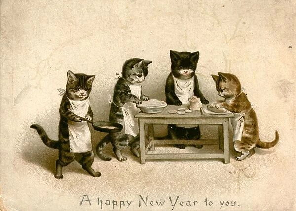 Cat Cooks. circa 1880: Kittens cooking rat pie on a New Years greetings card