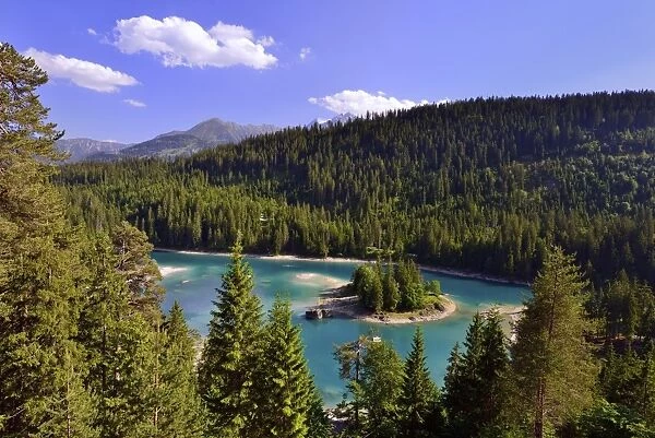 Caumasee lake surrounded by forest, near Flims, Grisons, Switzerland