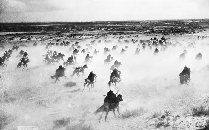 Framed Print : Cavalrymen On Horses Charge Into Distanc