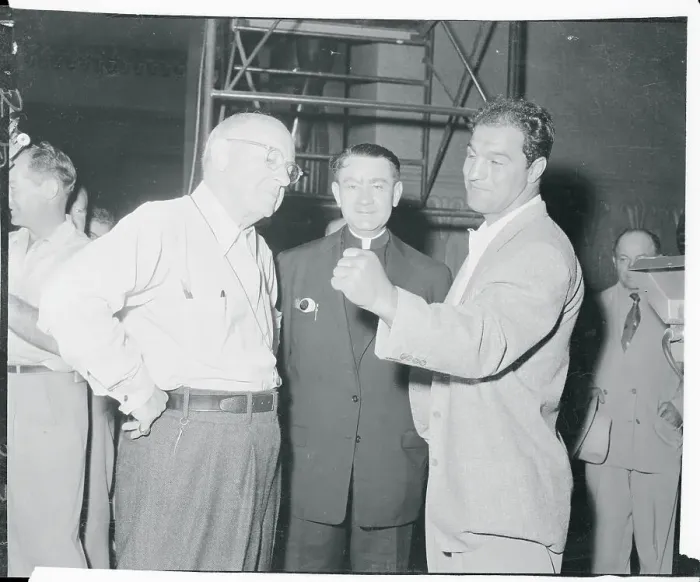 Framed Print : Cecil B. DeMille Conversing With Rocky Marciano and Priest Framed Print : Cecil B. DeMille Conversing With Rocky Marciano and Priest
