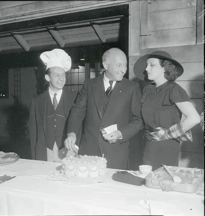 Framed Print : Cecil B. Demille Cutting Cake Framed Print : Cecil B. Demille Cutting Cake
