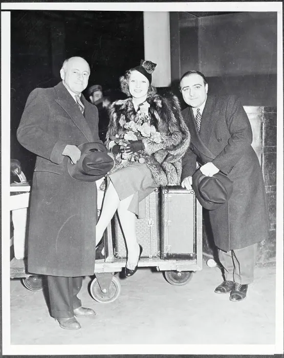 Framed Print : Cecil B. DeMille and Film Stars Posing Near Luggage Framed Print : Cecil B. DeMille and Film Stars Posing Near Luggage