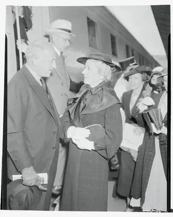 Framed Print : Cecil B. DeMille Talking With His Wife at Train Station Framed Print : Cecil B. DeMille Talking With His Wife at Train Station