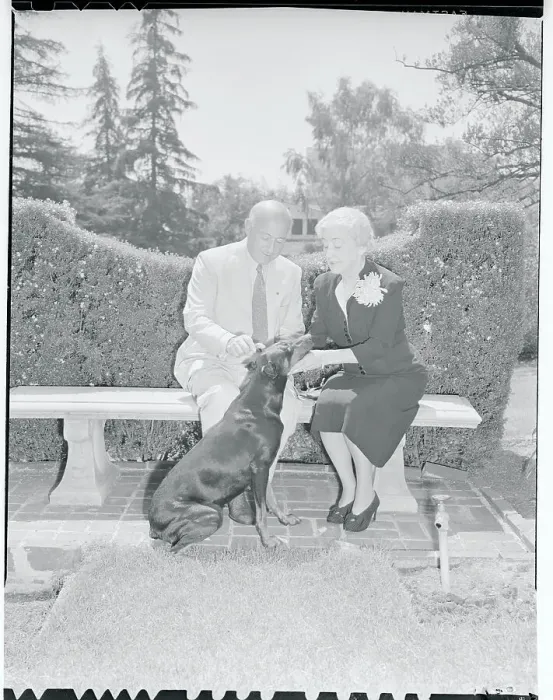 Framed Print : Cecil B. DeMille and Wife Sitting Outside With Dog Framed Print : Cecil B. DeMille and Wife Sitting Outside With Dog