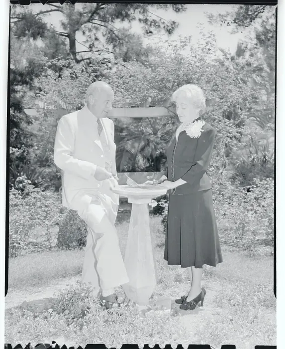 Framed Print : Cecil B. DeMille and Wife Standing at Outside Fountain Framed Print : Cecil B. DeMille and Wife Standing at Outside Fountain