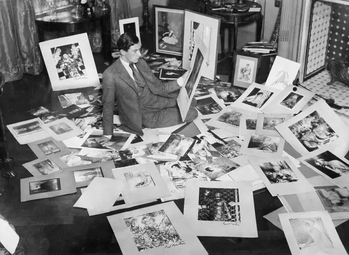 Framed Print : Cecil Beaton On Floor Choosing Pictures Framed Print : Cecil Beaton On Floor Choosing Pictures