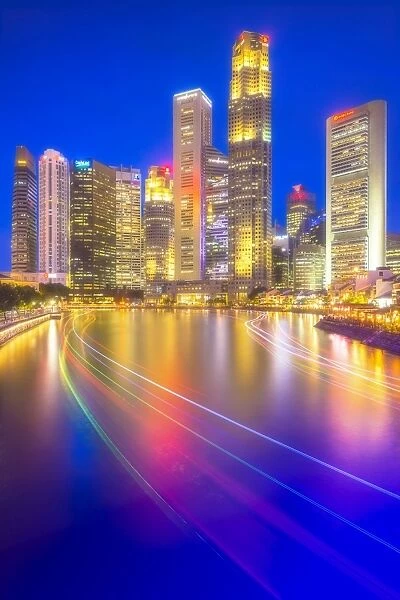 Central Business District view from Boat Quay with light trails in foreground, Singapore