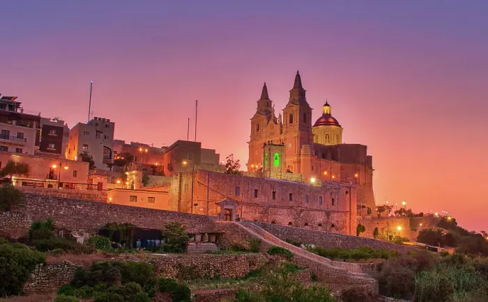 Framed Print : The Centre of Mellieha glows at sunset Framed Print : The Centre of Mellieha glows at sunset