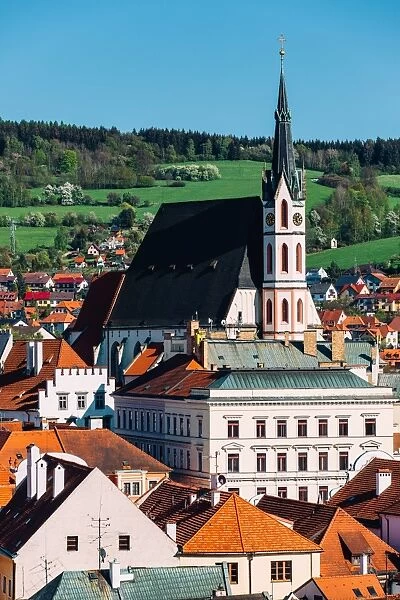 Cesky Krumlov cityscape with St. Vitus church on a sunny day, South Bohemia, Czech Republic