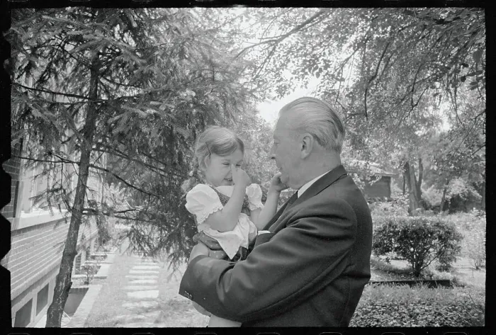 Framed Print : Chancellor Kurt George Kiesinger with Granddaughter Holding Nose