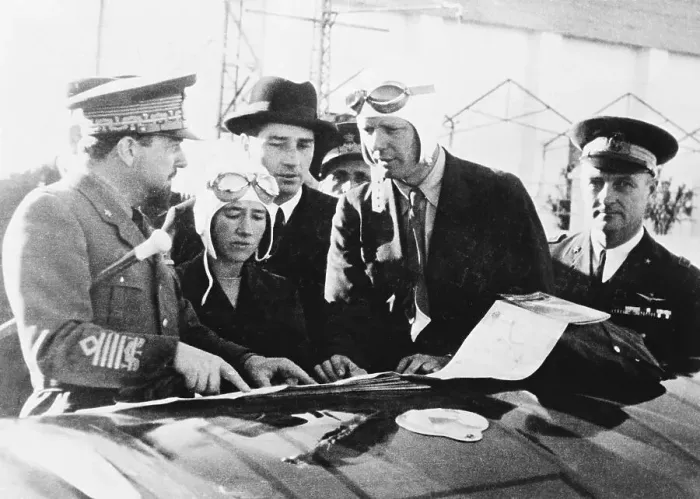 Framed Print : Charles and Anne Lindbergh Conferring with Italo Balbo Framed Print : Charles and Anne Lindbergh Conferring with Italo Balbo