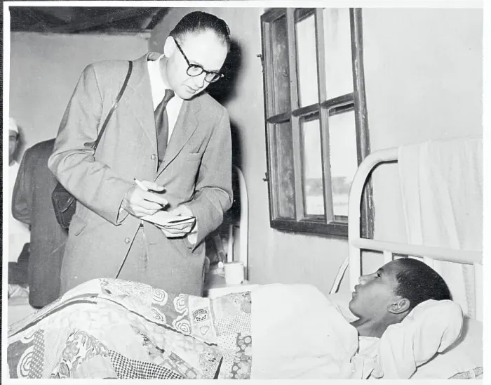 Framed Print : Charles Arnot Interviewing a Hospital Patient Framed Print : Charles Arnot Interviewing a Hospital Patient