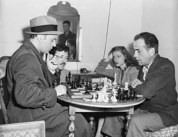 Framed Print : Charles Boyer & Humphrey Bogart Play Che Framed Print : Charles Boyer & Humphrey Bogart Play Che