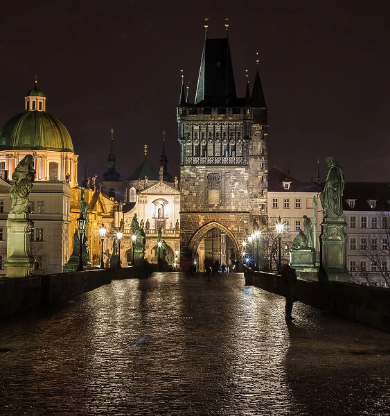 Charles Bridge on a rainy night in Prague