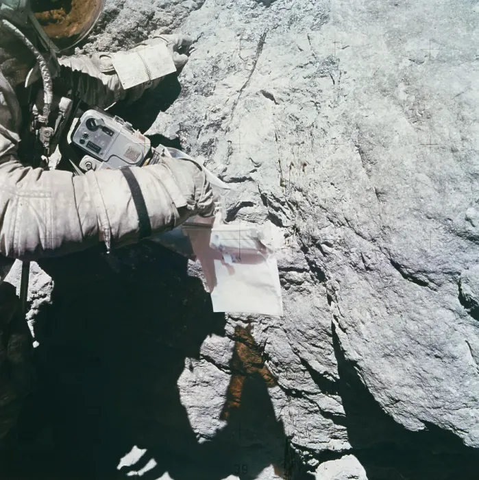 Framed Print : Charles Duke Looking at Lunar Rock Framed Print : Charles Duke Looking at Lunar Rock