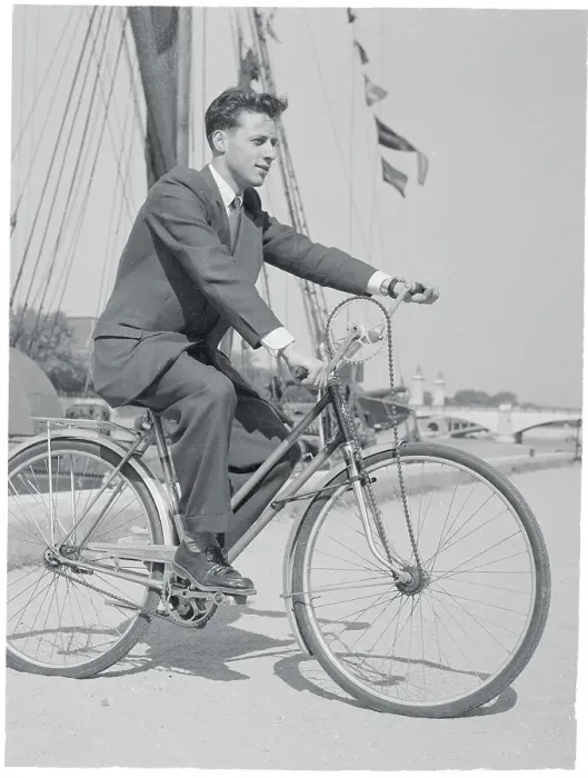 Framed Print : Charles Duval on His Invented Bicycle near Boat Dock Framed Print : Charles Duval on His Invented Bicycle near Boat Dock