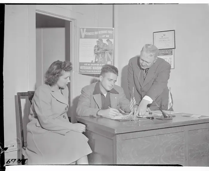 Framed Print : Charles E. Stanley Working at His Desk with Assistants Framed Print : Charles E. Stanley Working at His Desk with Assistants