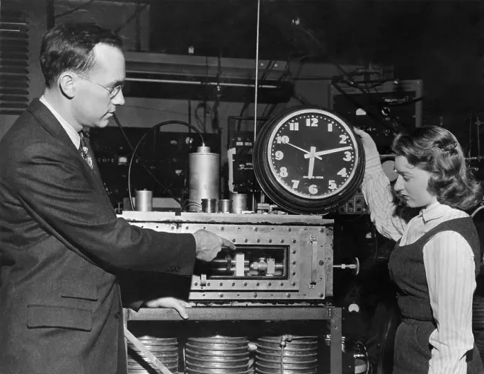Framed Print : Charles H. Townes Showing Atomic Clock to Marianne MacDonald Framed Print : Charles H. Townes Showing Atomic Clock to Marianne MacDonald