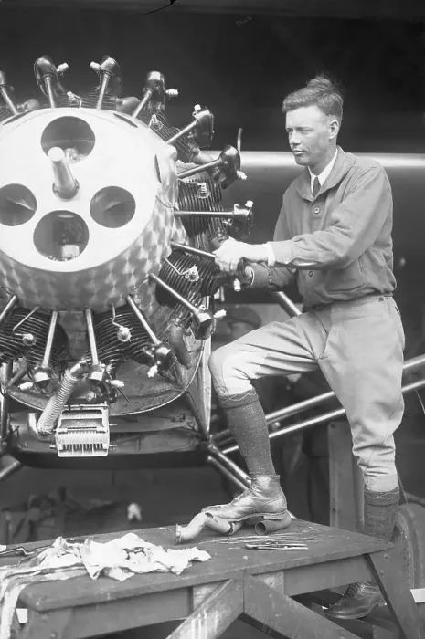 Framed Print : Charles Lindbergh Inspecting Airplane Motor for His Transatlantic Flight Framed Print : Charles Lindbergh Inspecting Airplane Motor for His Transatlantic Flight
