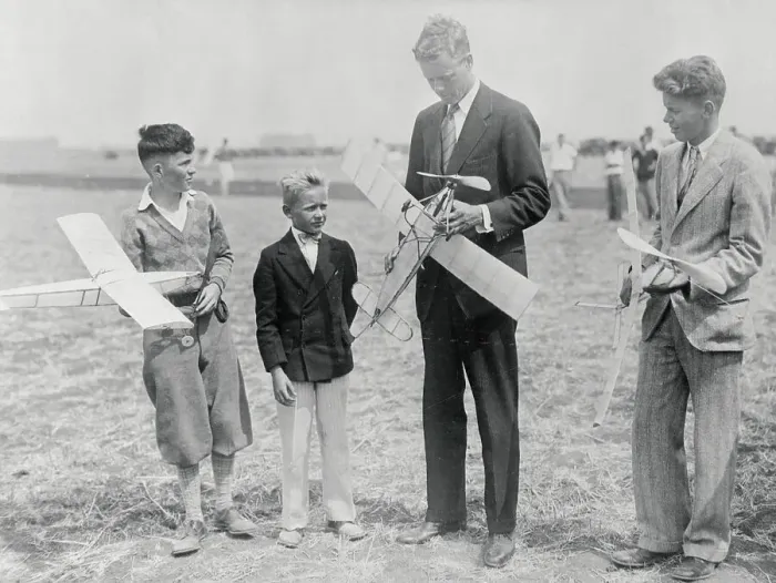 Framed Print : Charles Lindbergh Looking over Model Planes with Boys Framed Print : Charles Lindbergh Looking over Model Planes with Boys