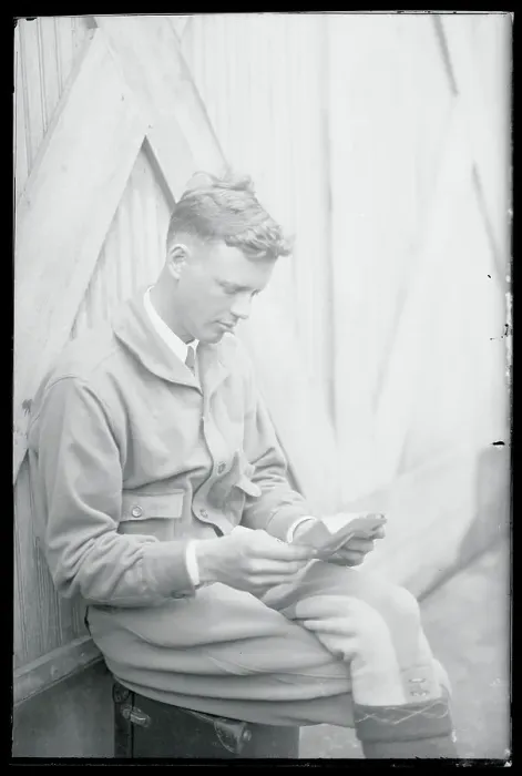 Framed Print : Charles Lindbergh Sitting and Reading Mail
