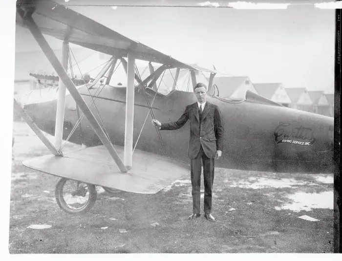 Framed Print : Charles Lindbergh Standing Next to Airplane Framed Print : Charles Lindbergh Standing Next to Airplane