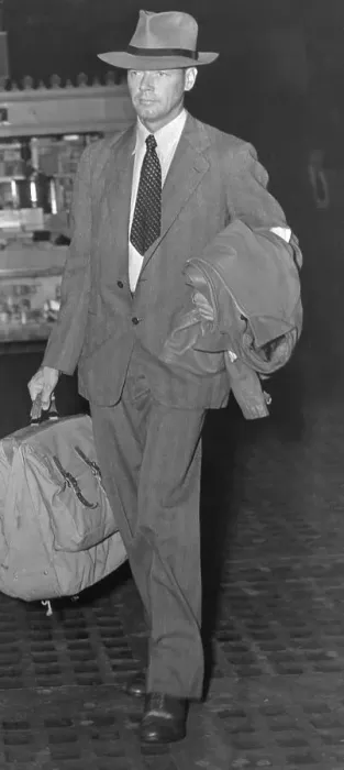 Framed Print : Charles Lindbergh Wearing Suit and Carrying Luggage Framed Print : Charles Lindbergh Wearing Suit and Carrying Luggage