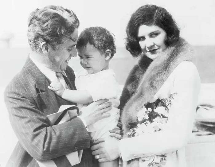 Framed Print : Charles And Lita Chaplin With Infant Son Framed Print : Charles And Lita Chaplin With Infant Son