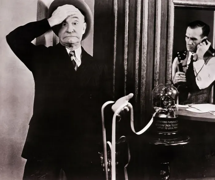 Framed Print : Charles Murray Reading Ticker-tape in Clancy in Wall Street