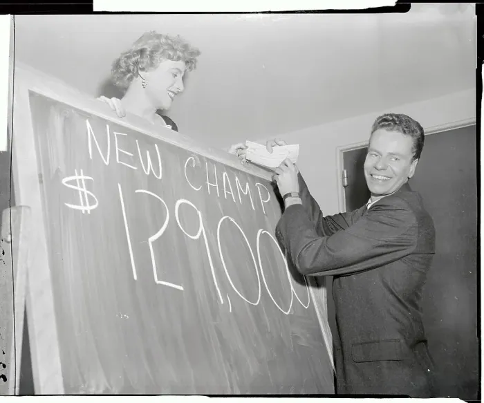 : Charles Van Doren With Woman and Check : Charles Van Doren With Woman and Check