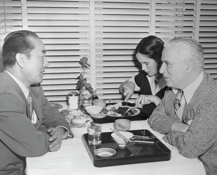 Framed Print : Charlie Chaplin Chatting with Sessue Hayakawa Framed Print : Charlie Chaplin Chatting with Sessue Hayakawa