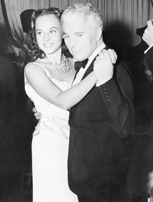 Framed Print : Charlie Chaplin Dancing with His Wife Framed Print : Charlie Chaplin Dancing with His Wife