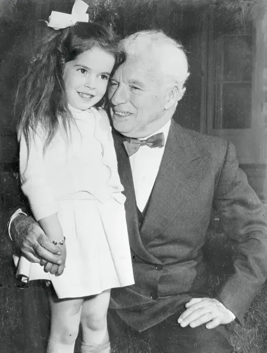 Framed Print : Charlie Chaplin with Daughter Framed Print : Charlie Chaplin with Daughter