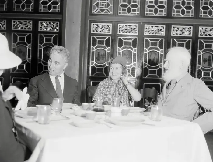 Framed Print : Charlie Chaplin and Others at Dinner Framed Print : Charlie Chaplin and Others at Dinner