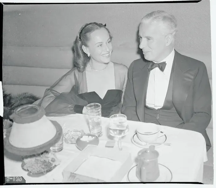Framed Print : Charlie Chaplin with Paulette Goddard