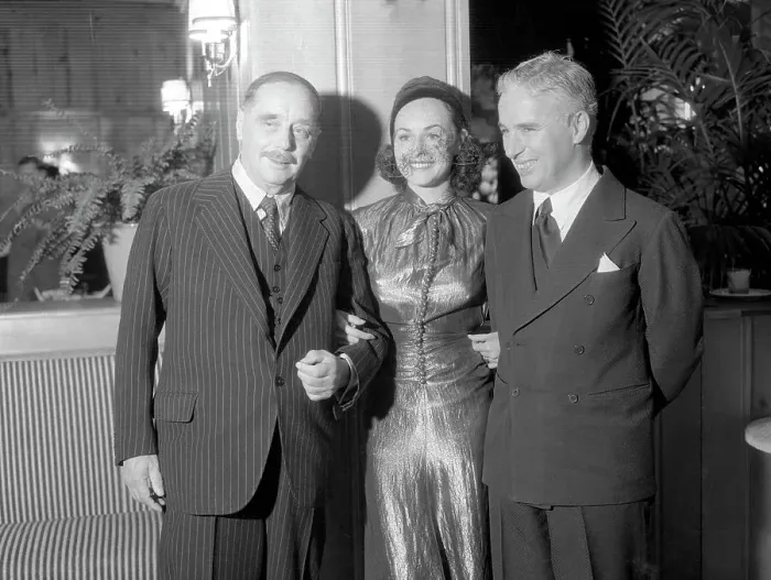 Framed Print : Charlie Chaplin and Paulette Goddard Posing with H.G. Wells Framed Print : Charlie Chaplin and Paulette Goddard Posing with H.G. Wells