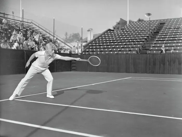 Framed Print : Charlie Chaplin Playing Tennis