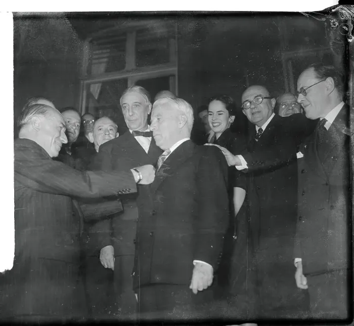 Framed Print : Charlie Chaplin Receiving a Medal Framed Print : Charlie Chaplin Receiving a Medal