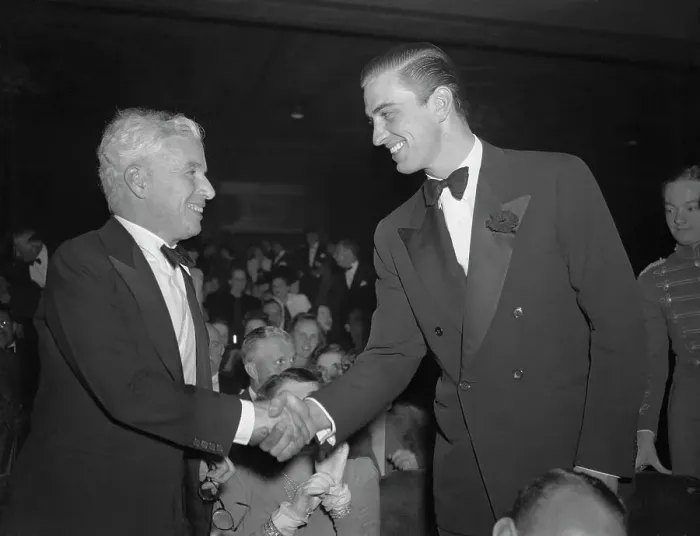 Framed Print : Charlie Chaplin Shaking Hands with Franklin Roosevelt Jr Framed Print : Charlie Chaplin Shaking Hands with Franklin Roosevelt Jr