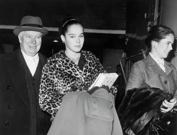 Framed Print : Charlie Chaplin With Wife and Daughter Framed Print : Charlie Chaplin With Wife and Daughter