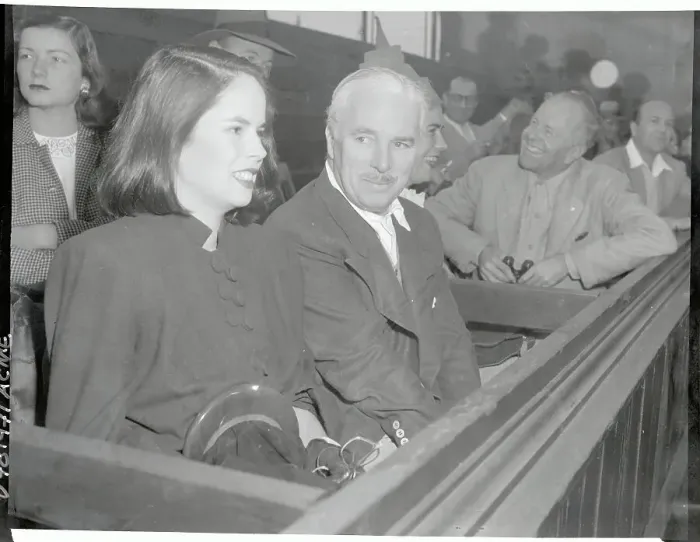 Framed Print : Charlie Chaplin and Wife Watching Tennis Match Framed Print : Charlie Chaplin and Wife Watching Tennis Match