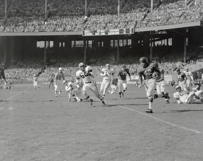 Framed Print : Charlie Connerly Carrying Football Framed Print : Charlie Connerly Carrying Football