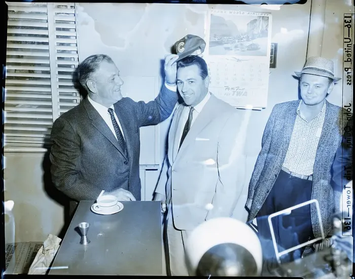 Framed Print : Charlie Grimm Puts Cap On Lou Boudreau Framed Print : Charlie Grimm Puts Cap On Lou Boudreau