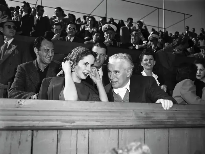 Framed Print : Charlie and Oona Chaplin Watching a Tennis Match Framed Print : Charlie and Oona Chaplin Watching a Tennis Match